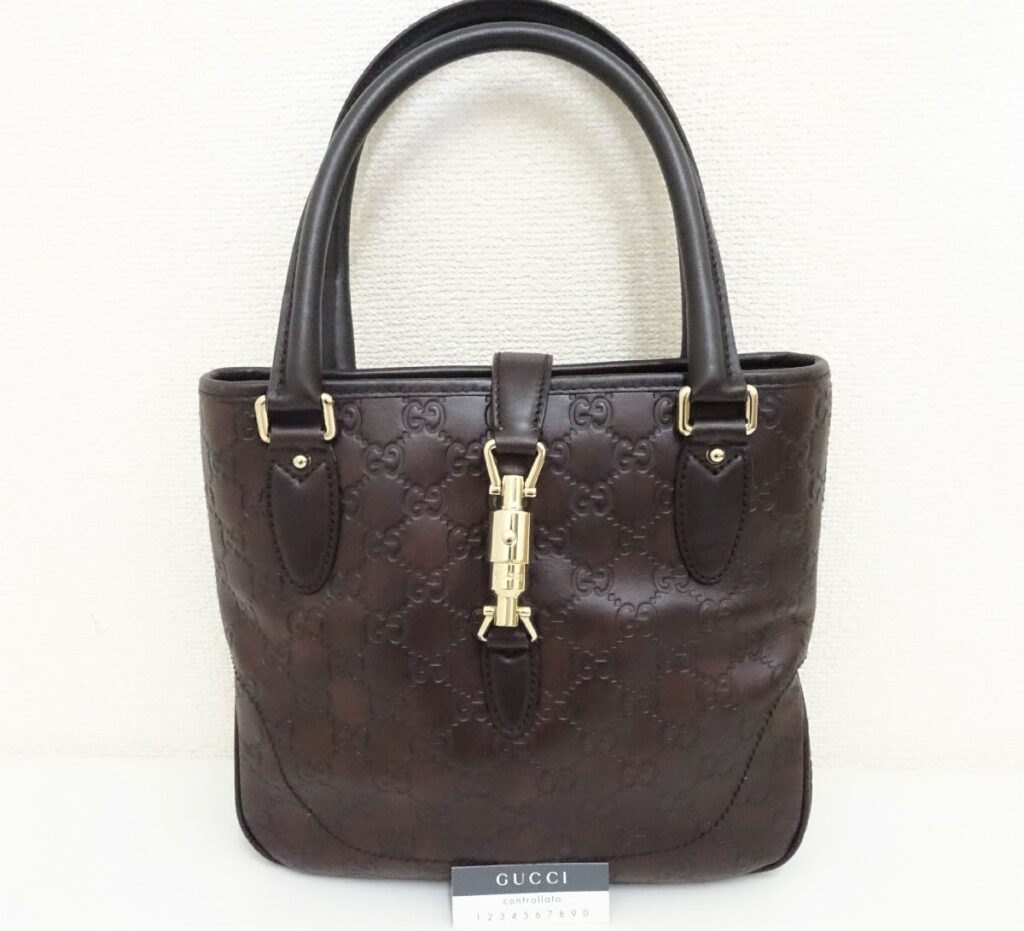 GUCCI グッチ レザー ハンドバッグ ブラウン 金具 GGロゴ 型押し 204999